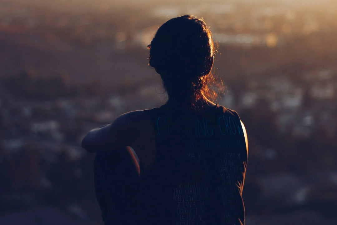 woman staring at city